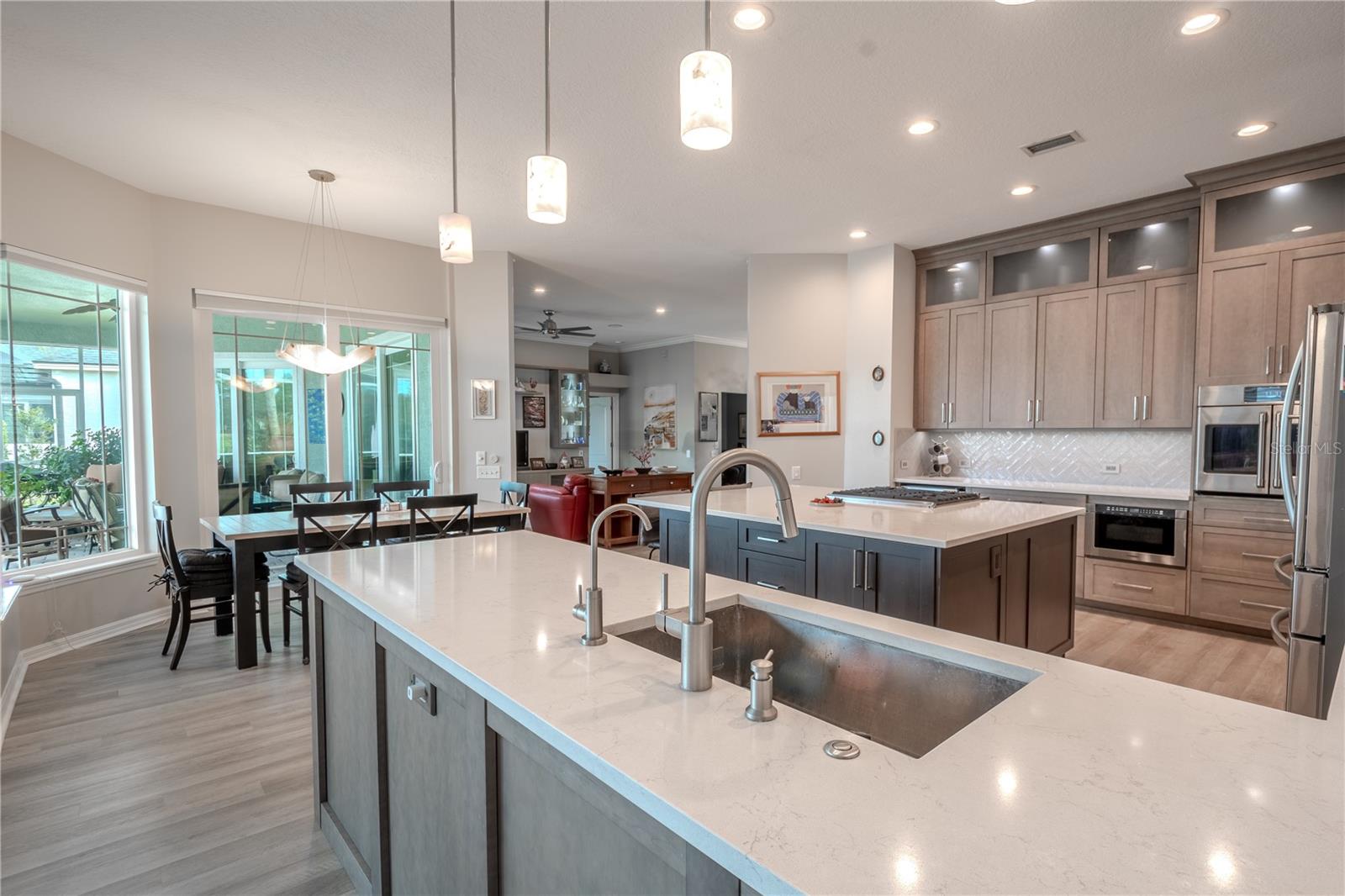 Stylish pendant light hangs above the kitchen counter.