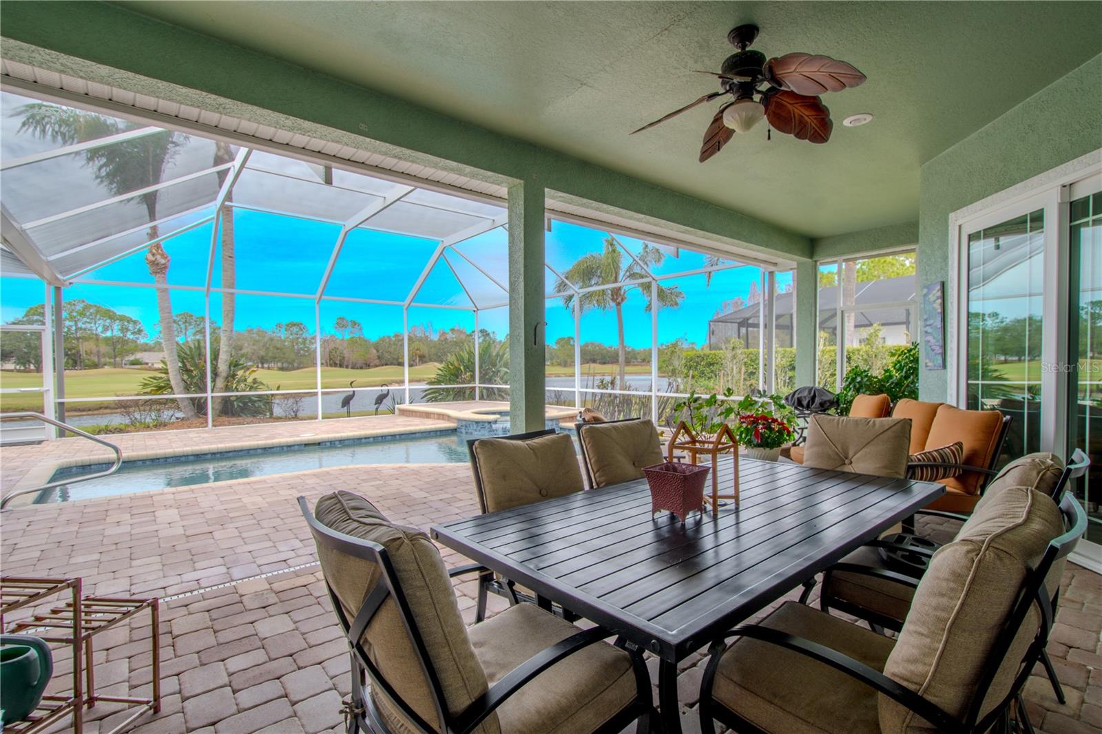 Your seating and dining area is under cover, and beneath a ceiling fan.