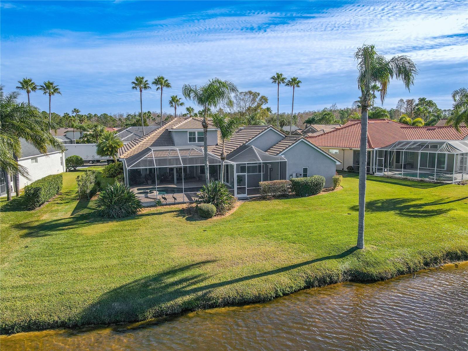 Large grassy backyard.