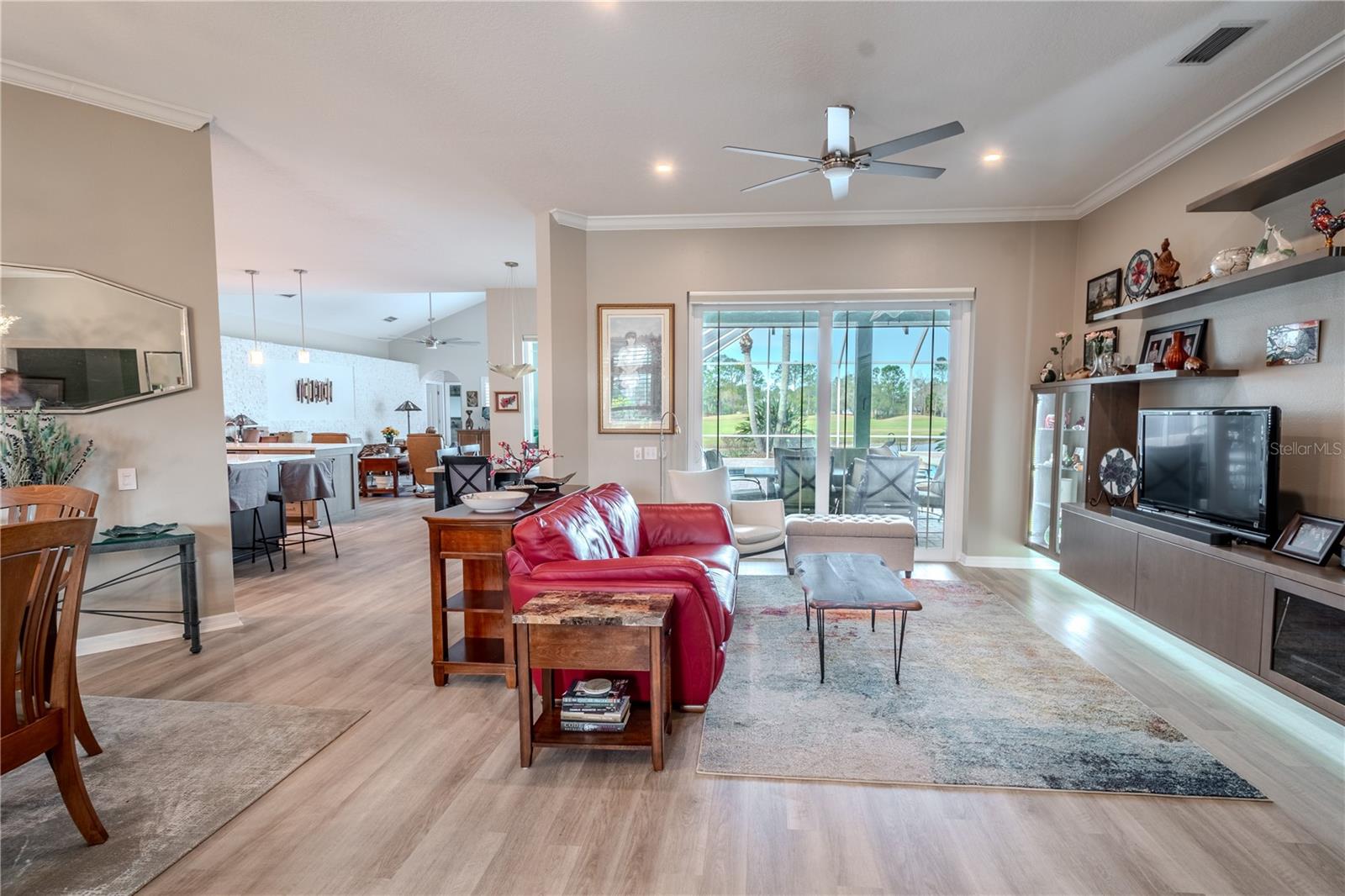 The living room is open to the dining room and kitchen for ease of entertaining.