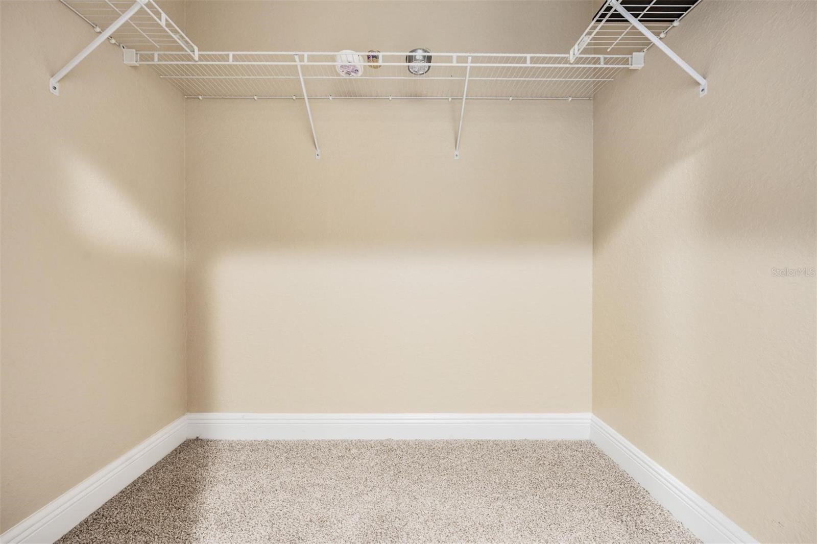 Walk-In Closet in Primary Bedroom