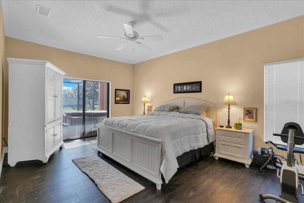 Primary Bedroom with view of patio