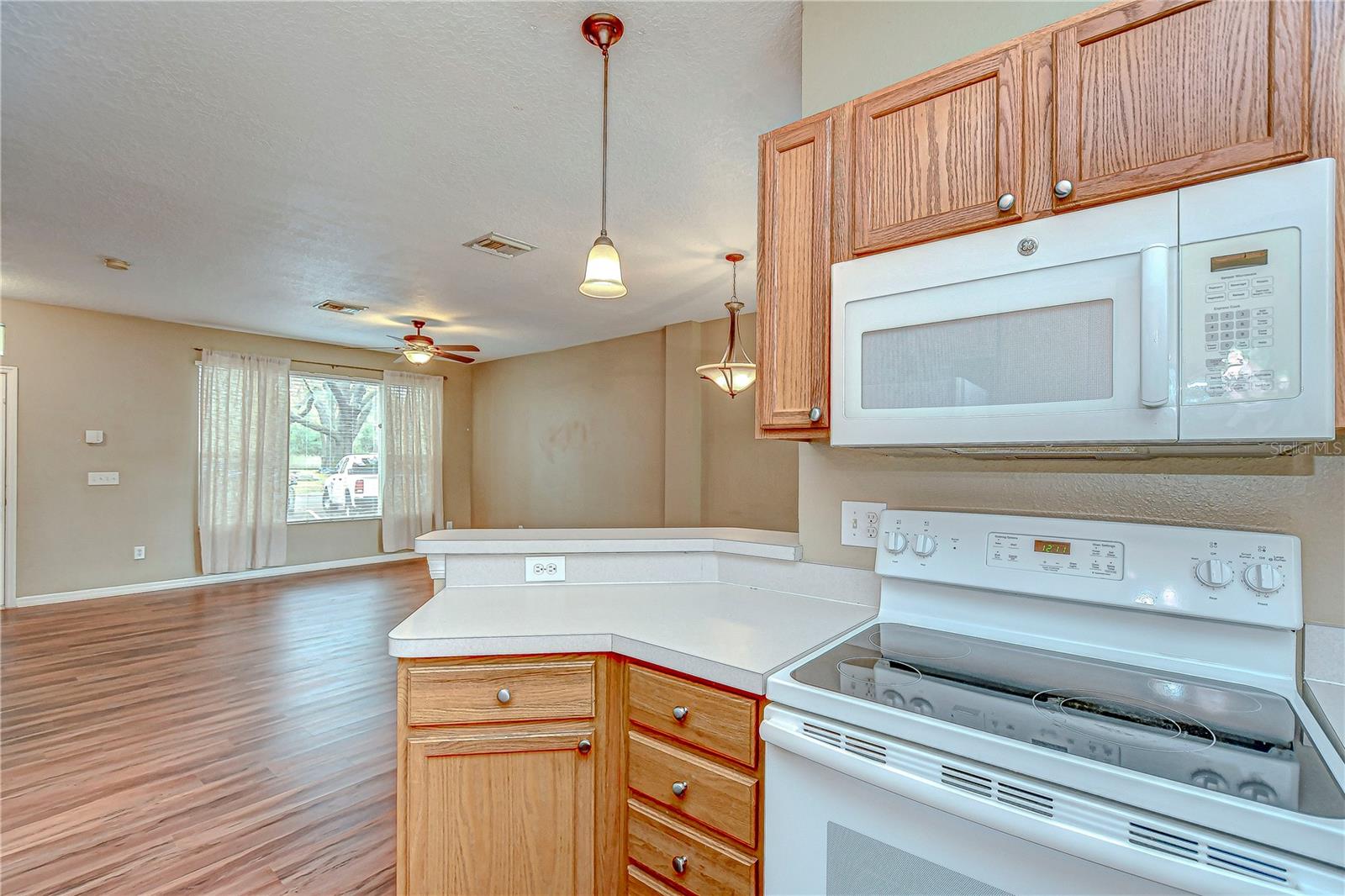 Kitchen flows into the living room so you never miss a thing!