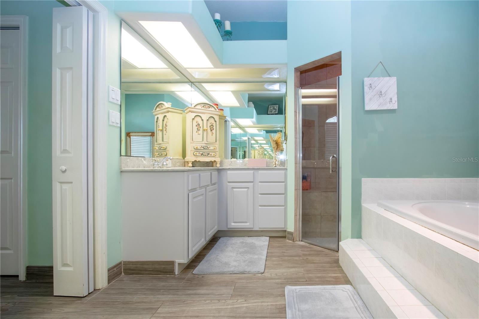 Owners Suite Bathroom View Of Split Dual VAnity And Sink