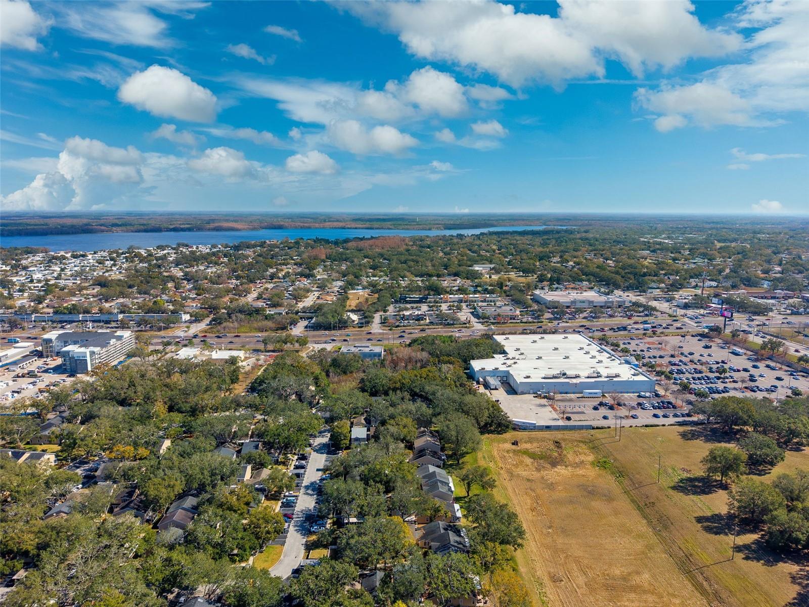 Aerial View of Pool (Tennis/Pickleball Courts and Shuffleboard on left)