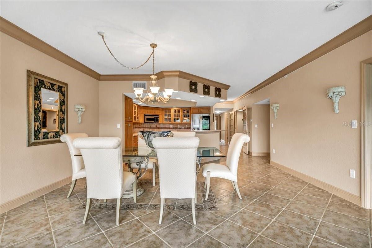 The Open Floor Plan Seamlessly connects the Living Room, Dining Area, and Kitchen