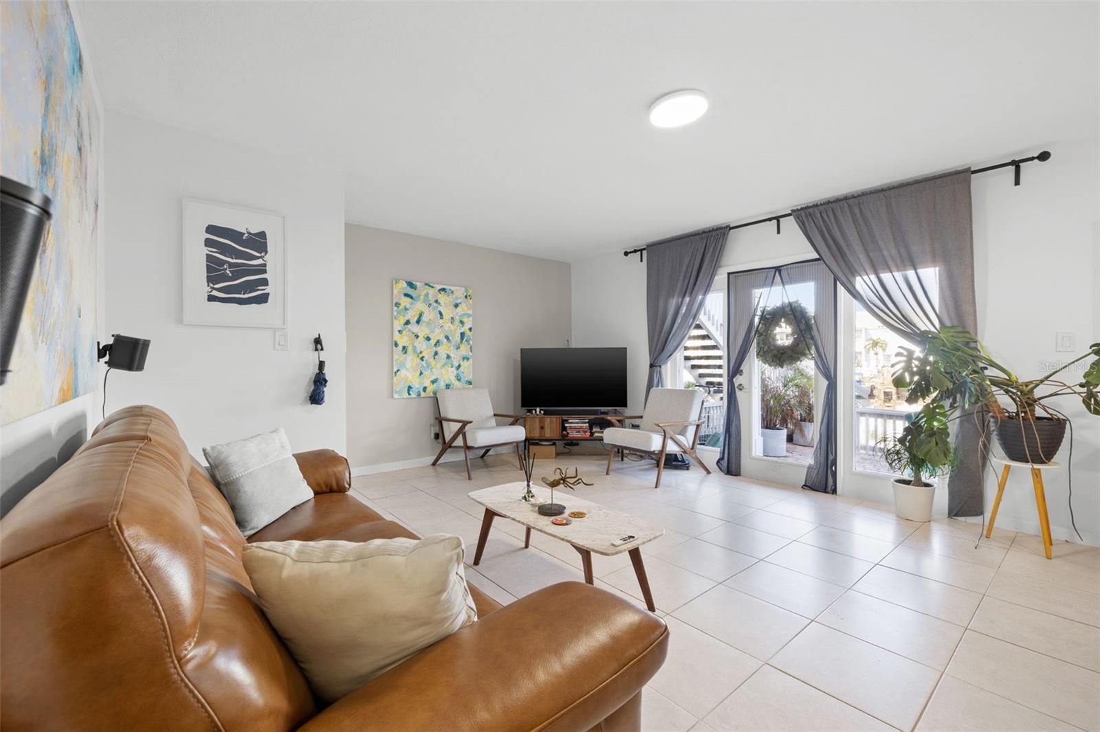 Living Room Opens Up To Water View