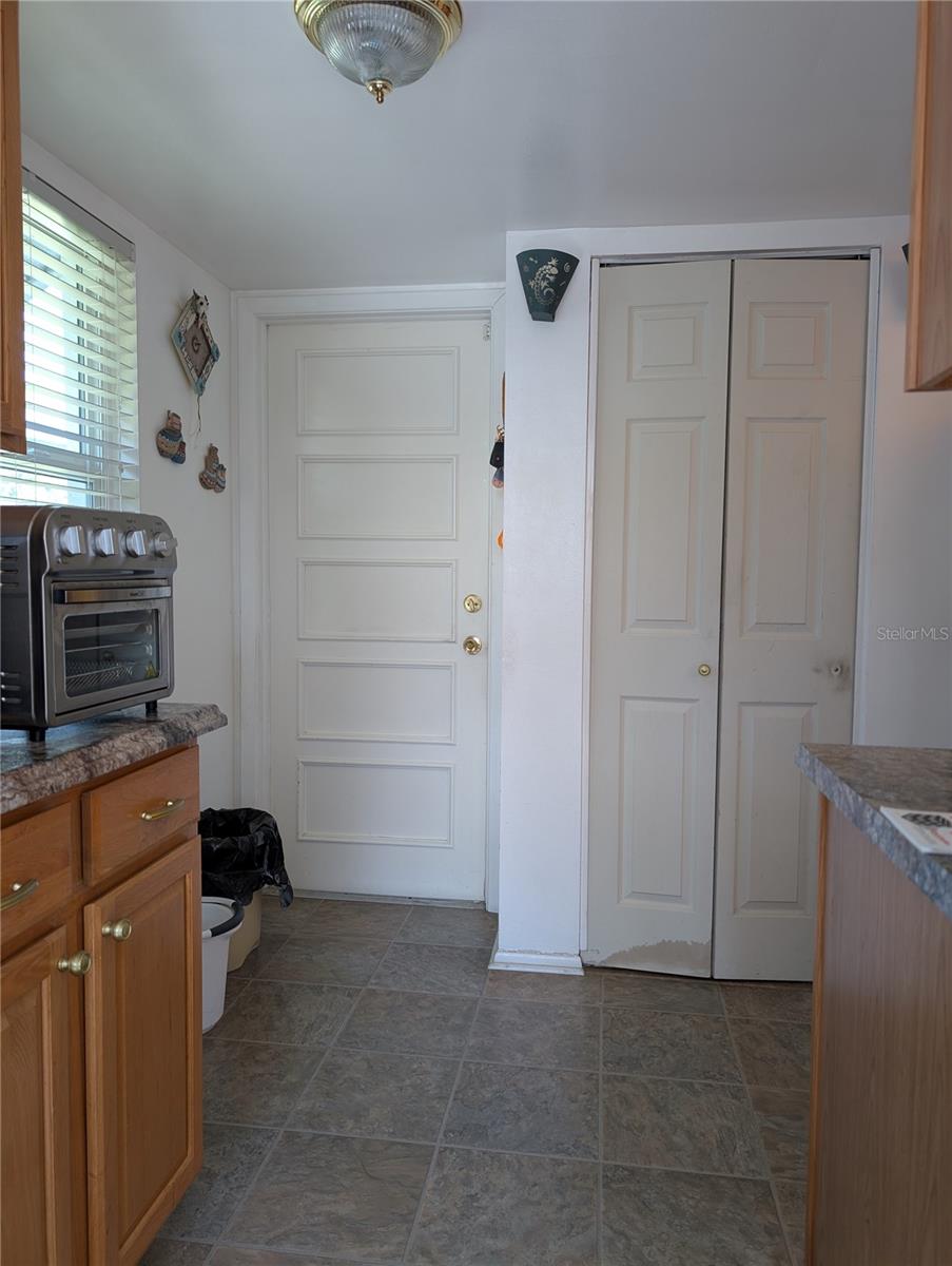 Wall Pantry and Door to Garage