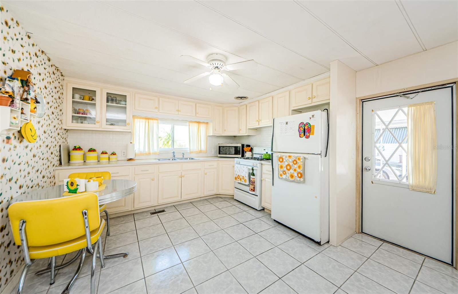 Kitchen and side entrance from carport