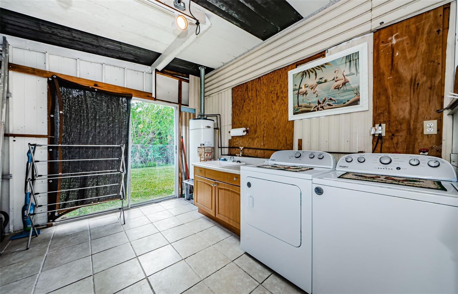 Very Large Utility and Storage room w/New Washer Dryer and utility sink