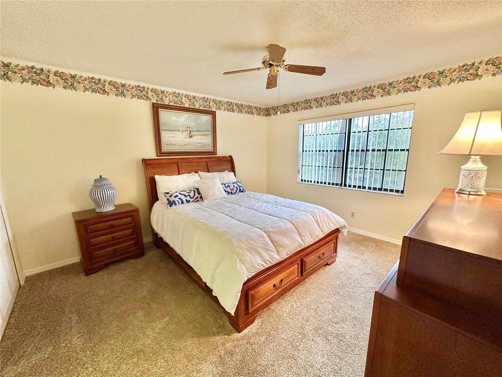 Master Bedroom with view of pond