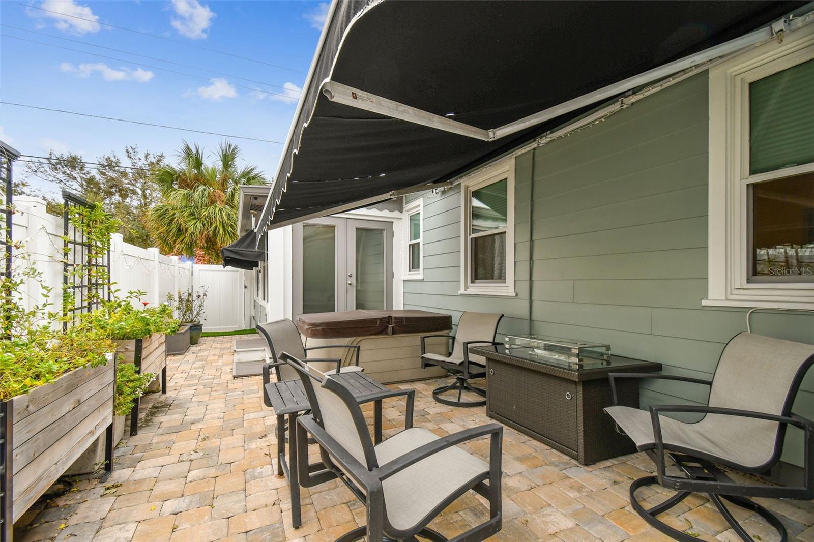 Retractable awning on back porch