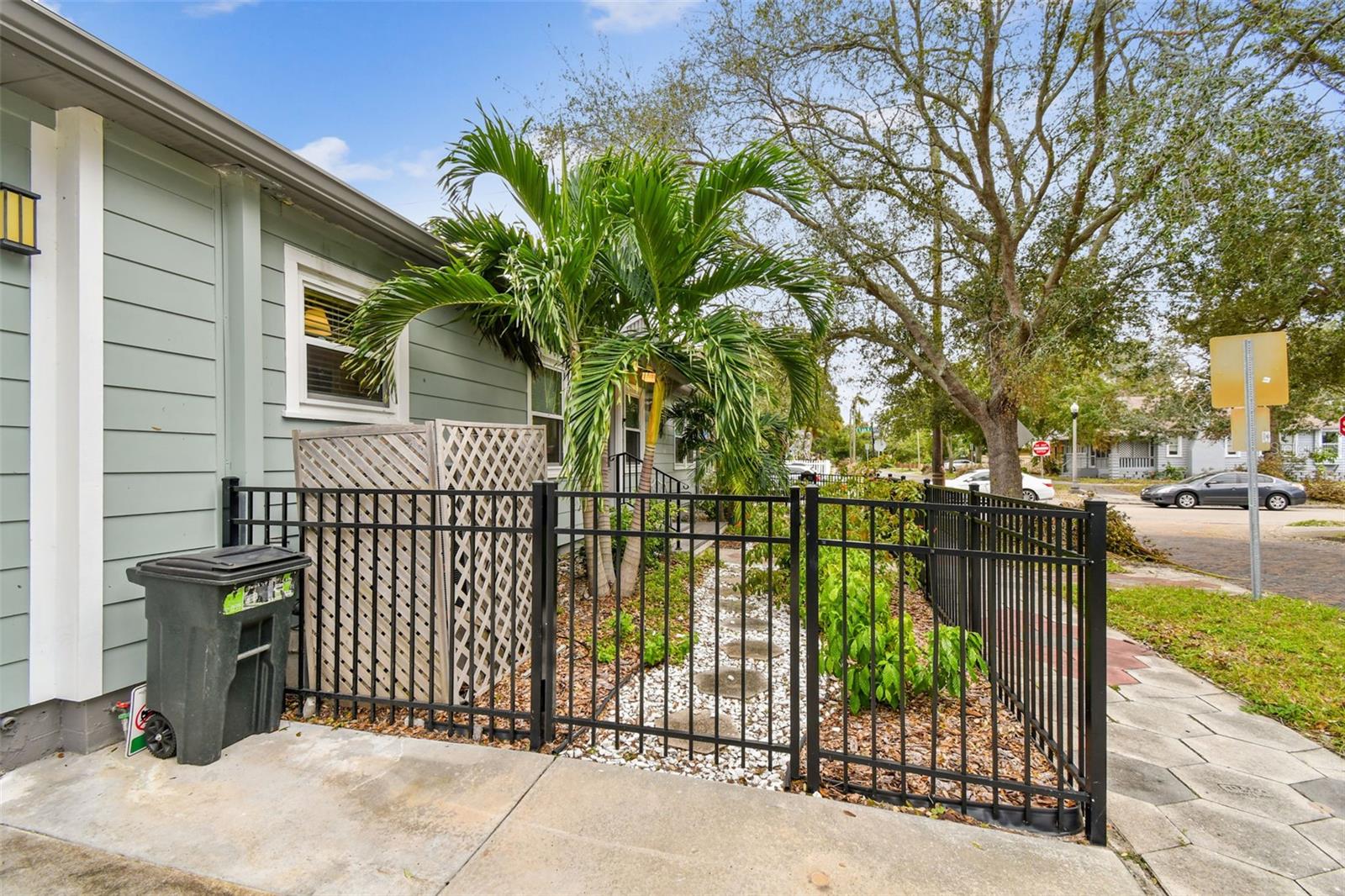 2 classic iron gates to enter from of home