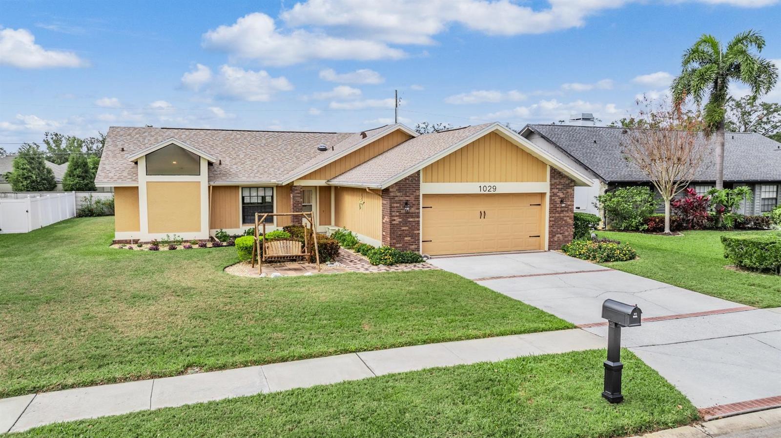 Located in Falcon Ridge - Homes RARELY come up for sale in this HIGHLY sought after Palm Harbor neighborhood!  This large BLOCK home has a wonderful open floor plan, with 3 bedrooms, 2 bathrooms, plus A FLEX SPACE (great for an office/study, playroom, game room, craft room), INSIDE laundry room, and a 2-car garage wired for an electric car charger! NEW ROOF 2024, NEW AC 2021, NEW WATER HEATER 2022, NEW EXTERIOR PAINT.  In addition, this lovely home is approximately 60 Feet Above Sea Level in a NON-EVACUATION ZONE and NO FLOOD ZONE!