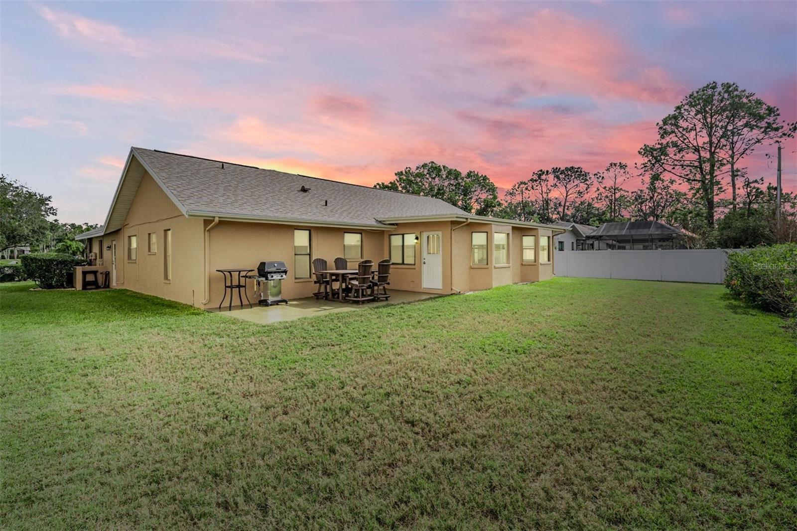 Back yard: Enjoy grilling or playing some outdoor games while you enjoy the stunning Florida sunset colors that paint the sky!