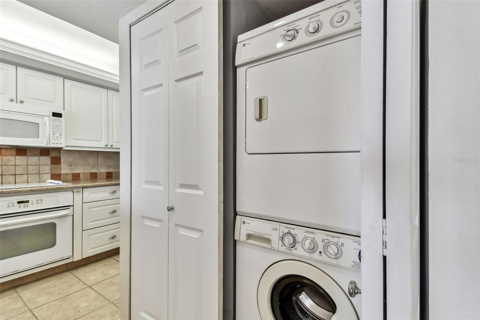 Laundry closet as you enter kitchen