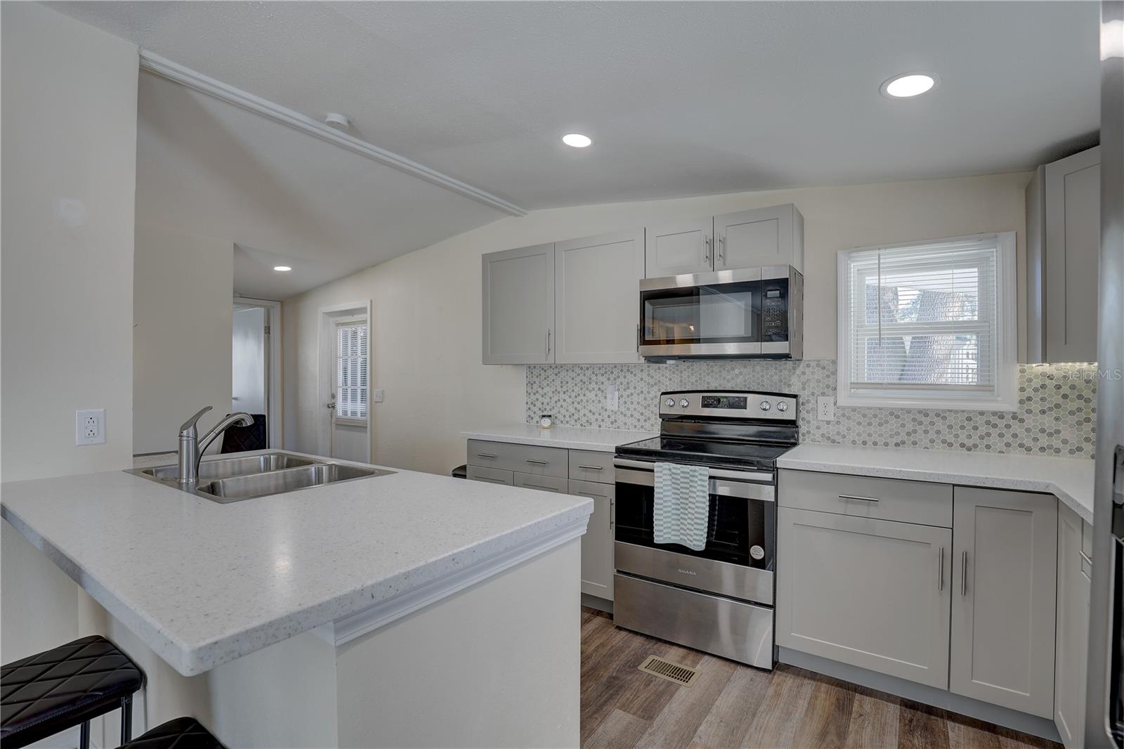 View of kitchen from living room