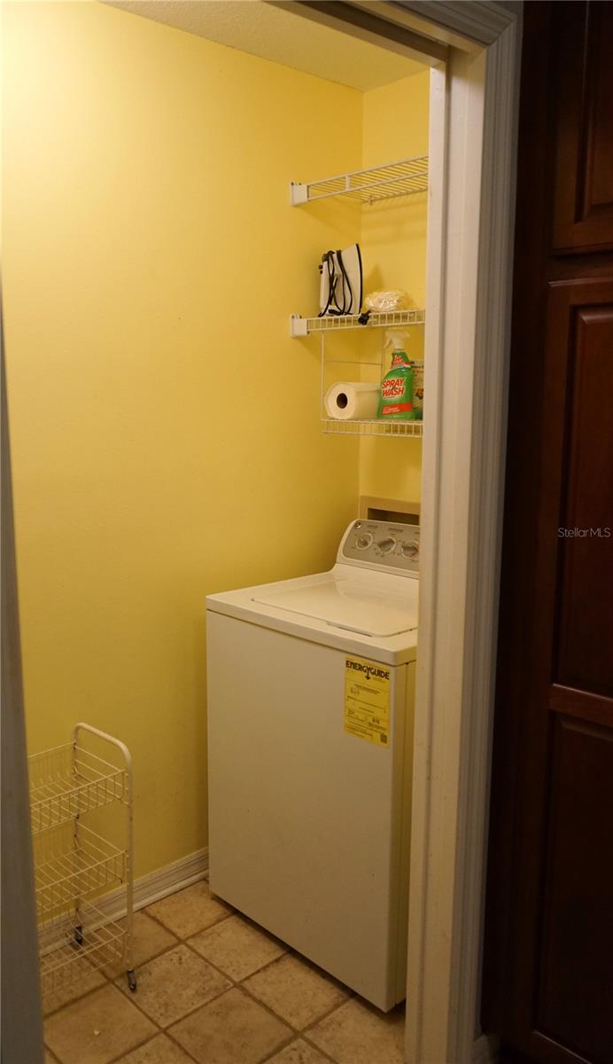 laundry closet in kitchen