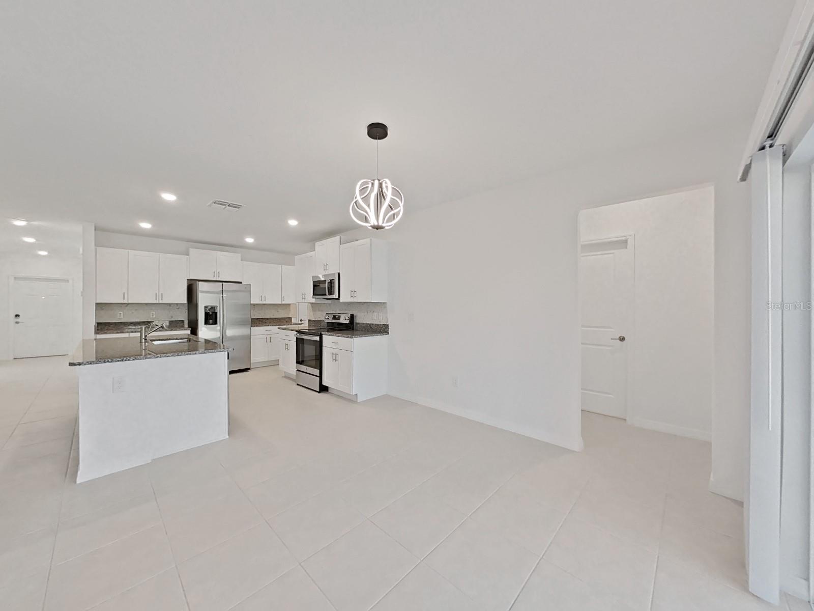 Wide kitchen and dinning.