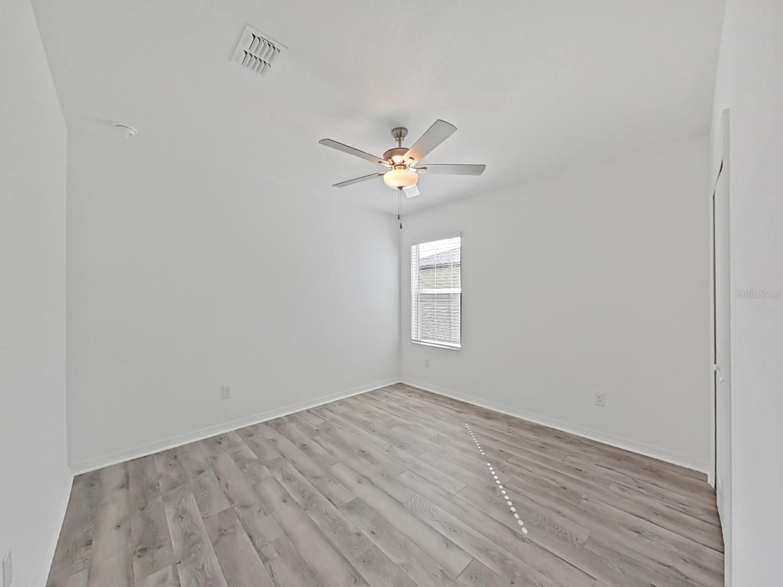 Laminate floor in the guest room.