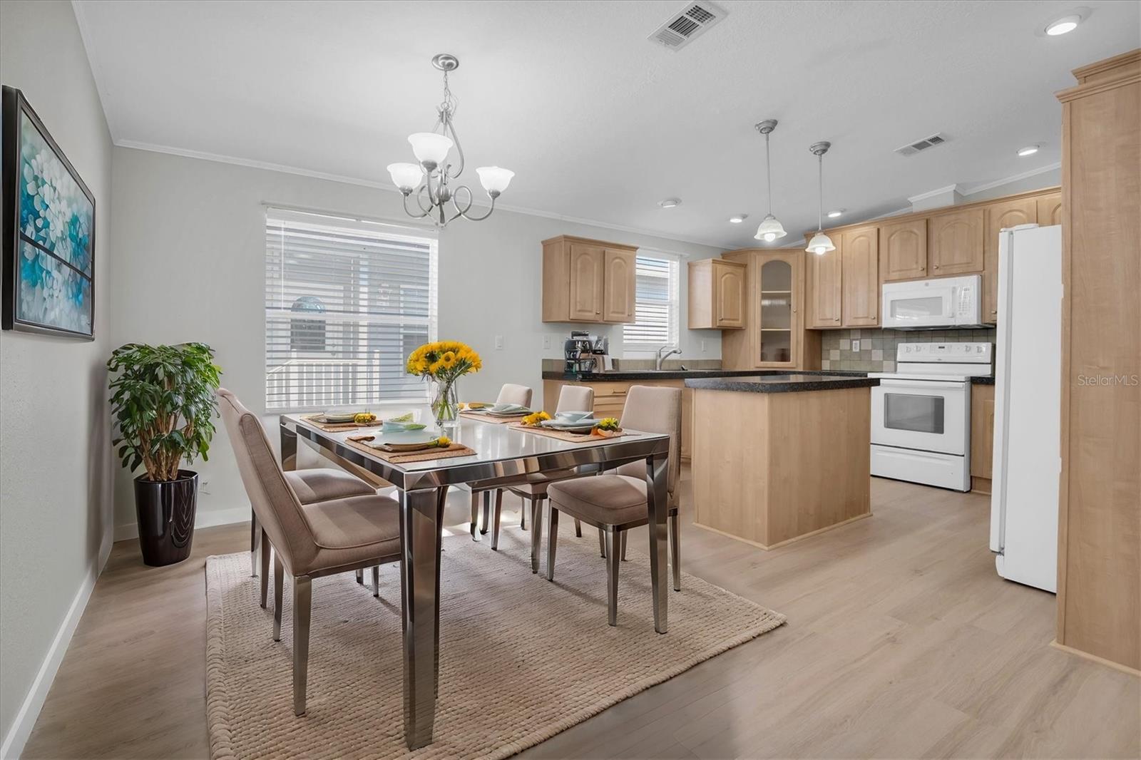 Large dining area with new LVP flooring