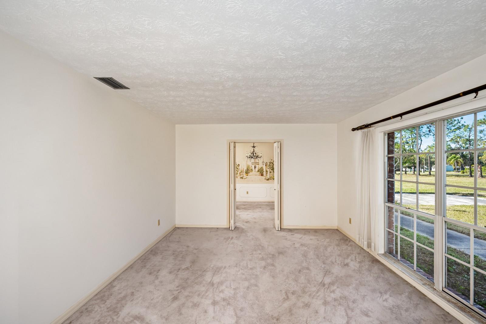 GREAT LIGHTING FROM LIVING ROOM LOOKING INTO DINING ROOM