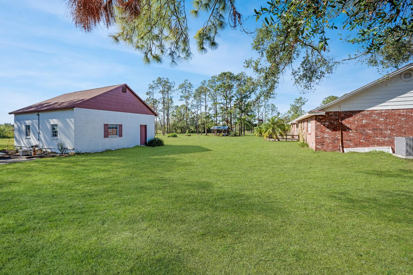 DETACHED GARAGE SHOWING PAD FOR RV