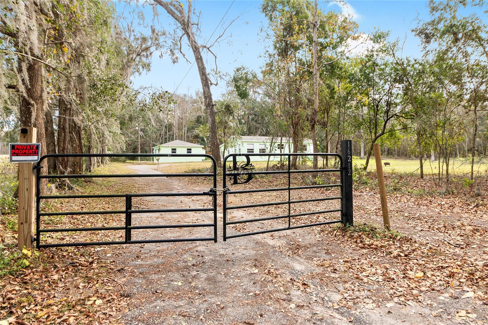 Enjoy the private 300' driveway with gated entrance.