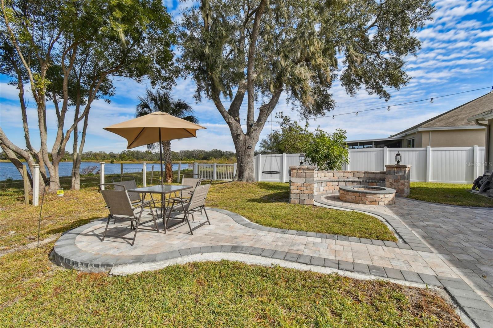 Fenced In outdoor area where you can see the peaceful pond