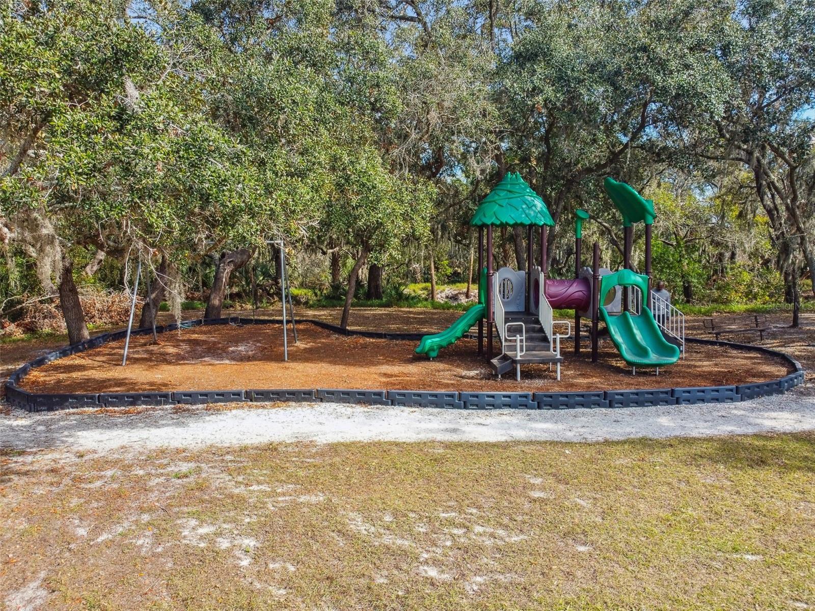 Park located within HOA Community with small small walking trail