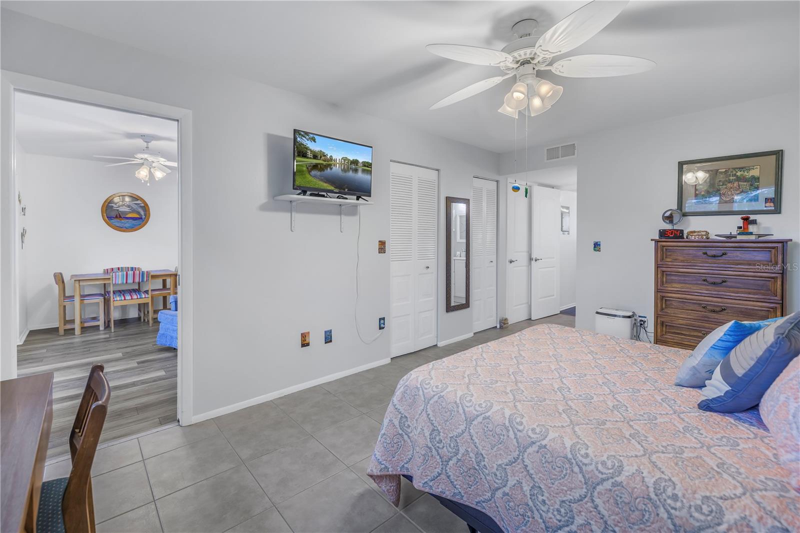 Spacious primary bedroom offers a walk-in and linen closet.