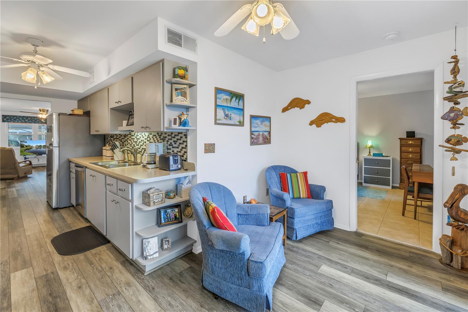 Sitting area off the kitchen featuring water views.