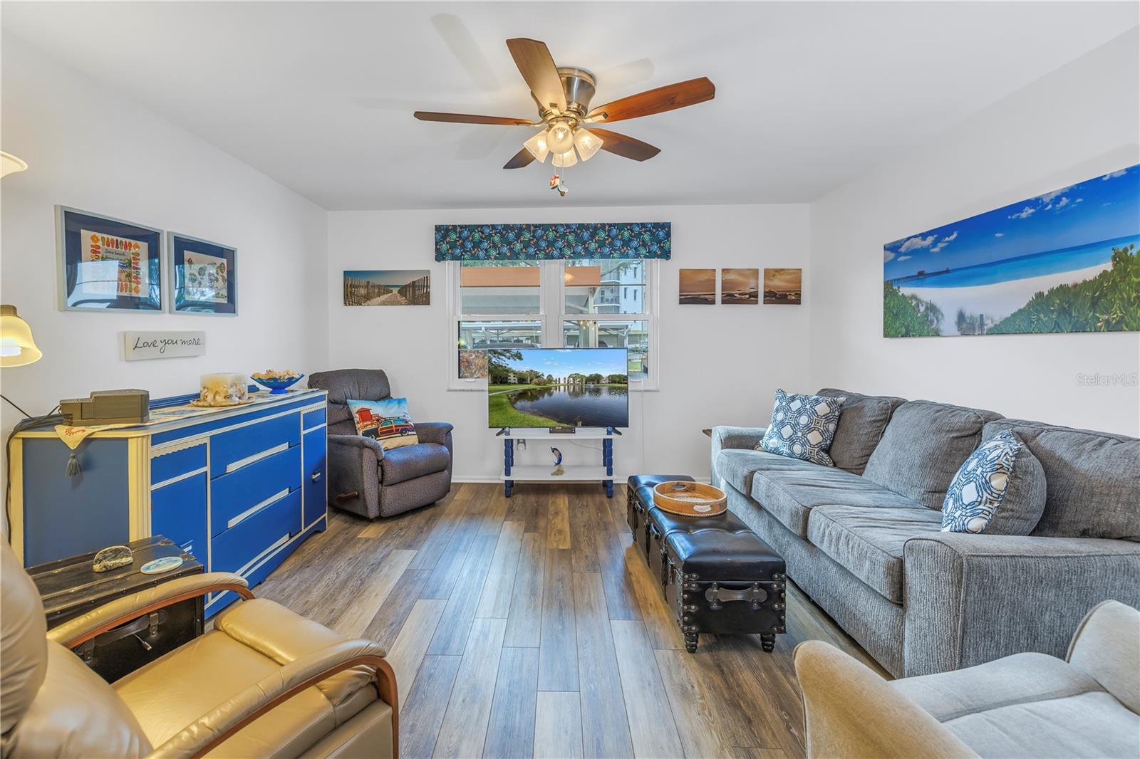 Living room offering luxury vinyl flooring.