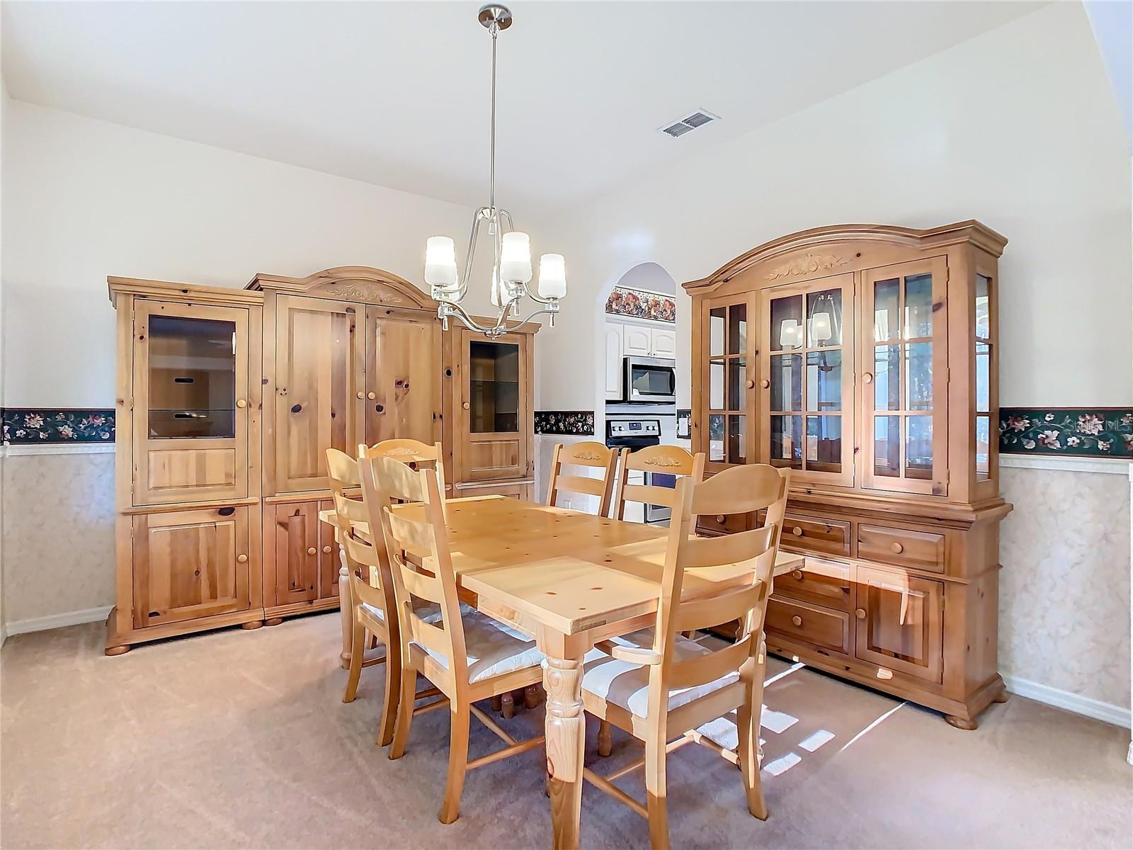 Formal dining room with ample space for hosting gatherings