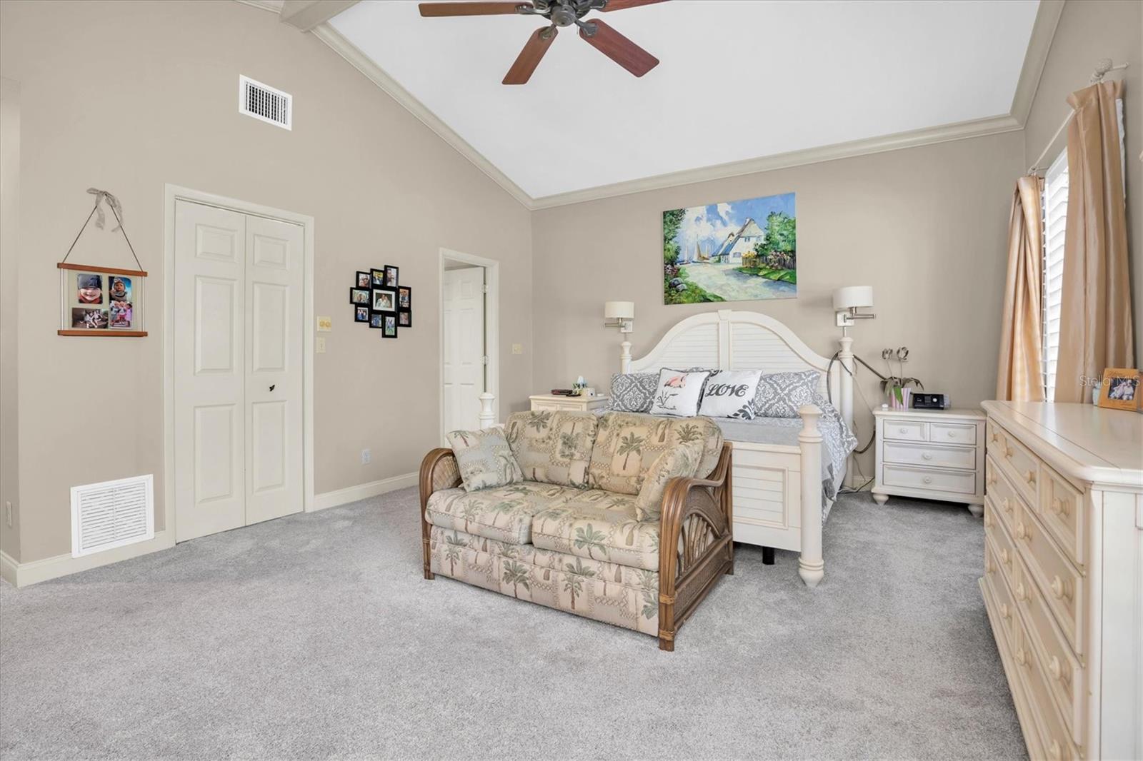 Primary bedroom with walk in closet