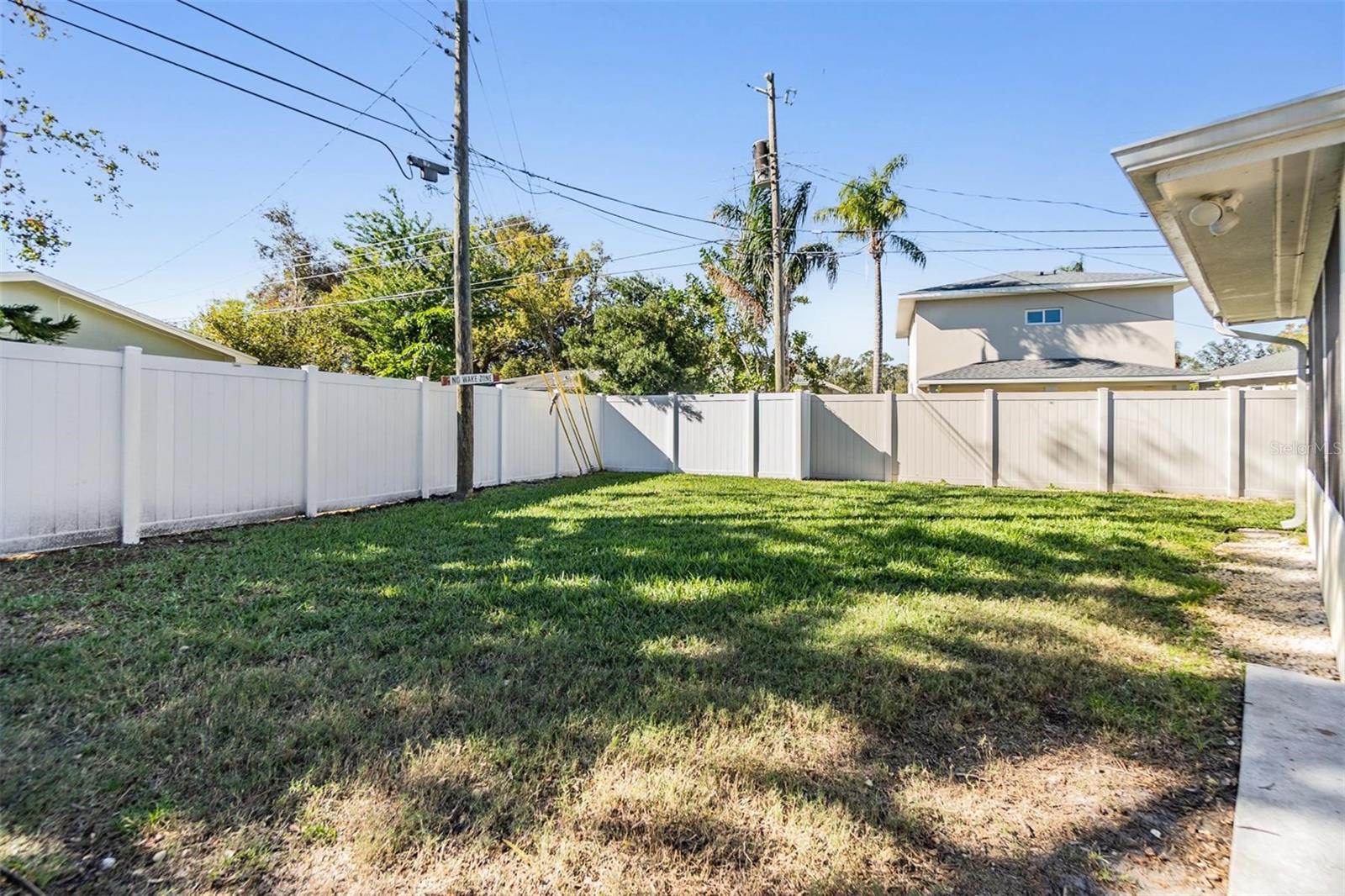 Oversized fenced in back yard area.