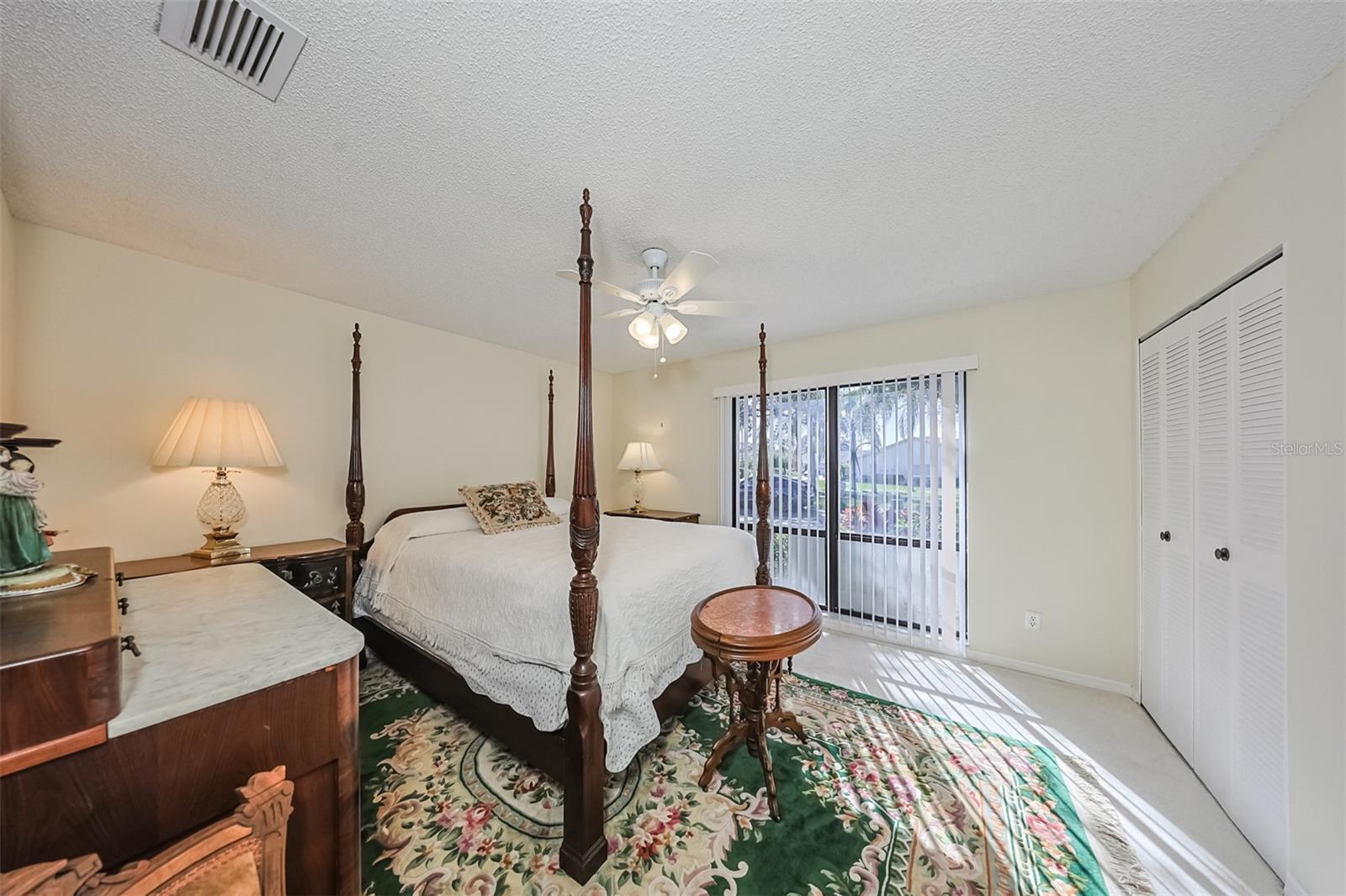 Guest Bedroom with plenty of natural lighting from the large window. Includes spacious closet for storage.