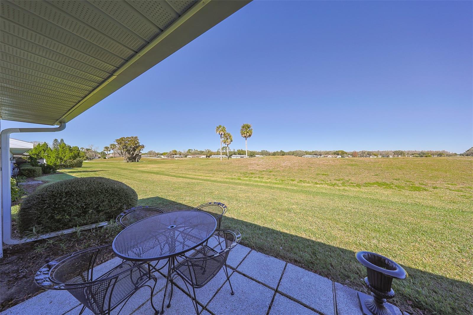 An outside patio allows you to enjoy the privacy of your backyard while you watch the world or wildlife go by.  Privacy!!