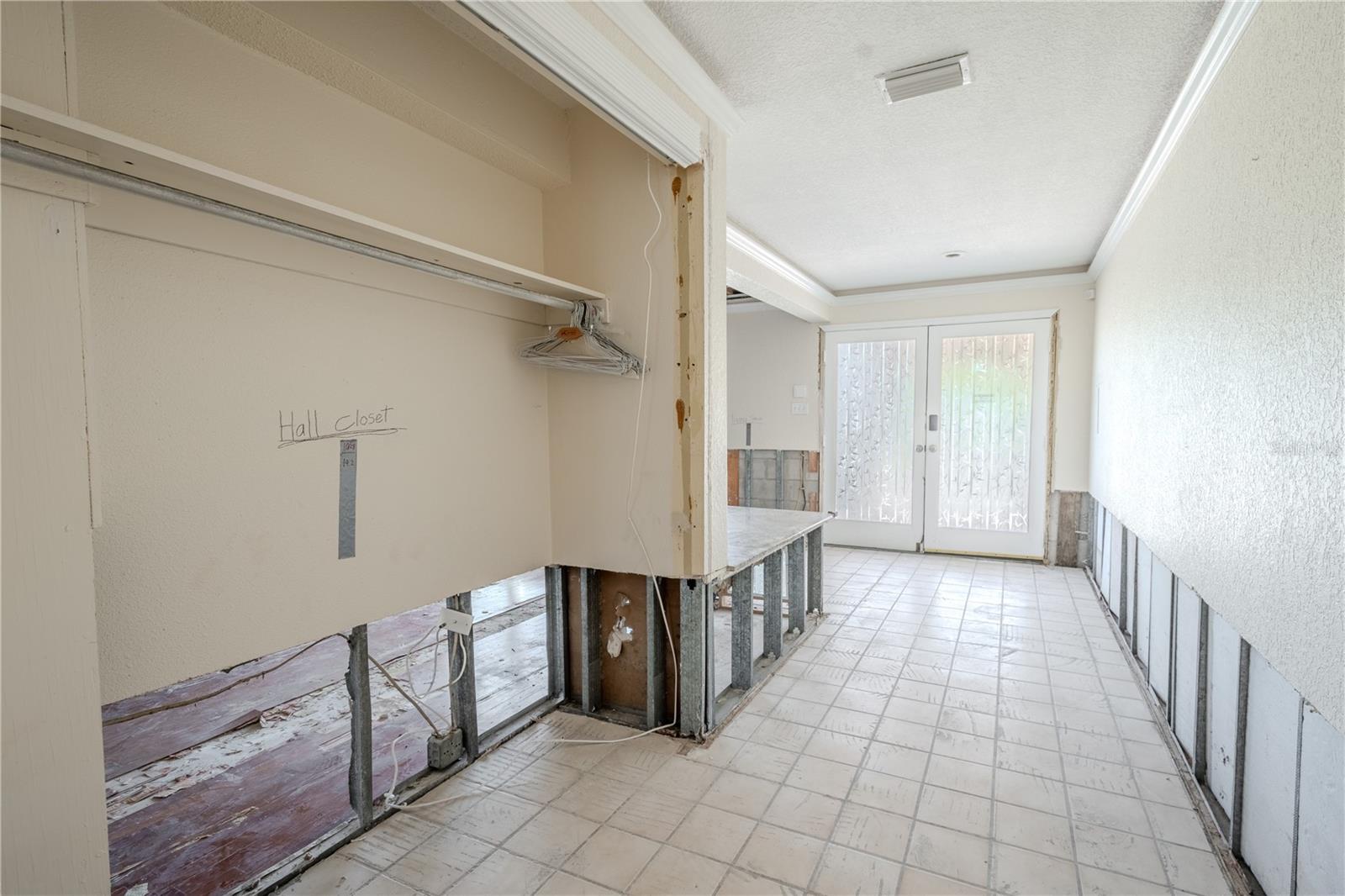 Foyer features a spacious built-in coat closet.