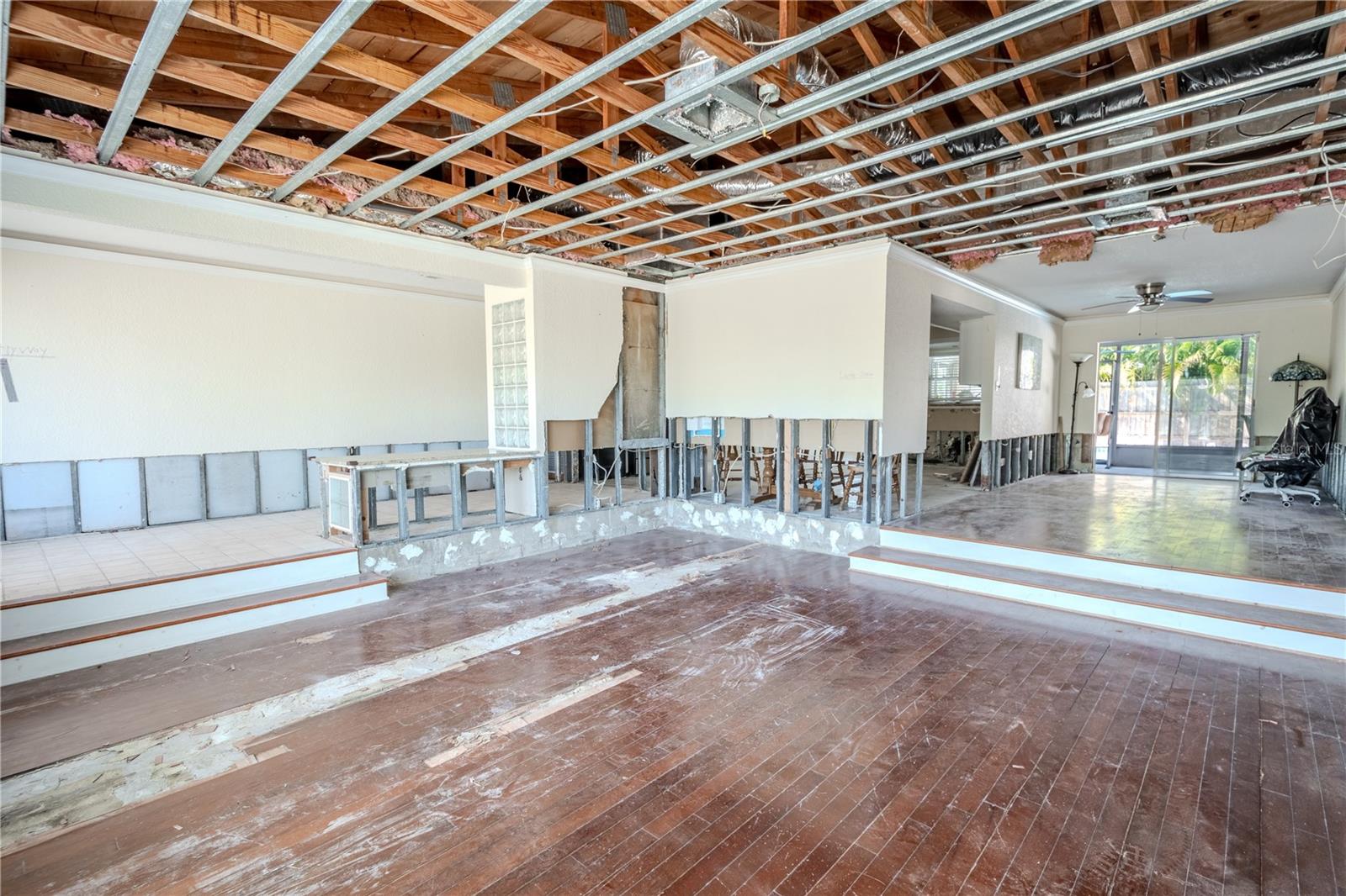 Step down to the formal living room.