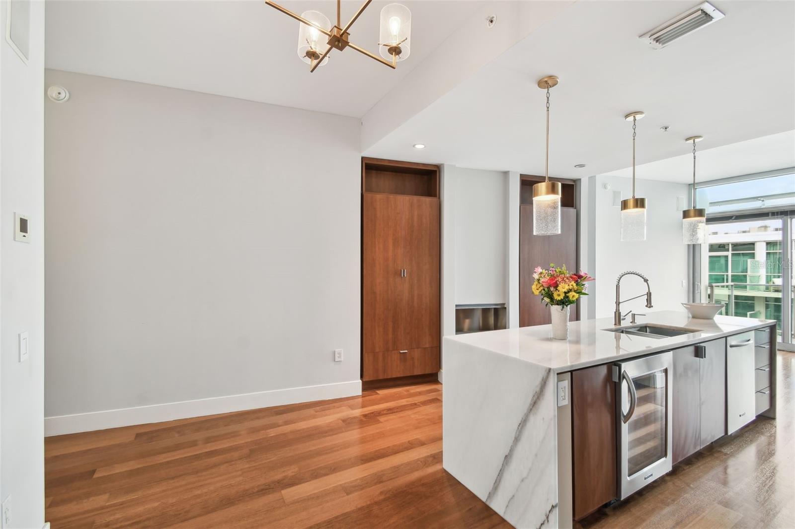 Kitchen features under counter wine chiller.