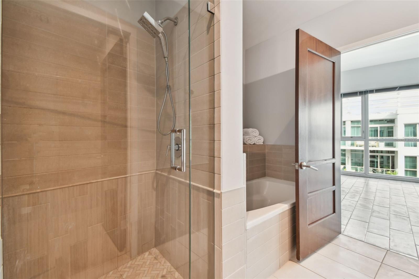 Separate shower stall.