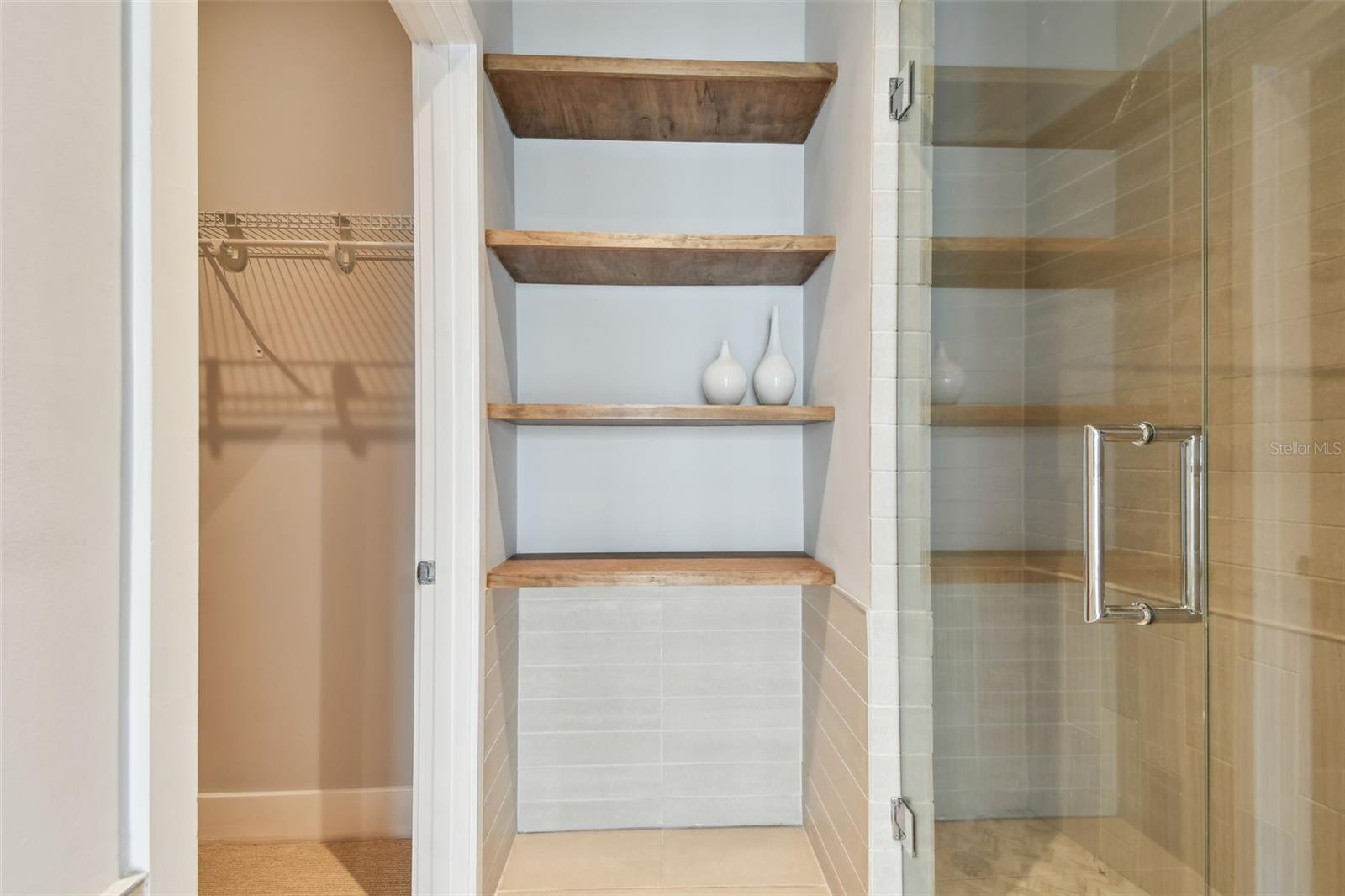 Extra storage shelving in bathroom.