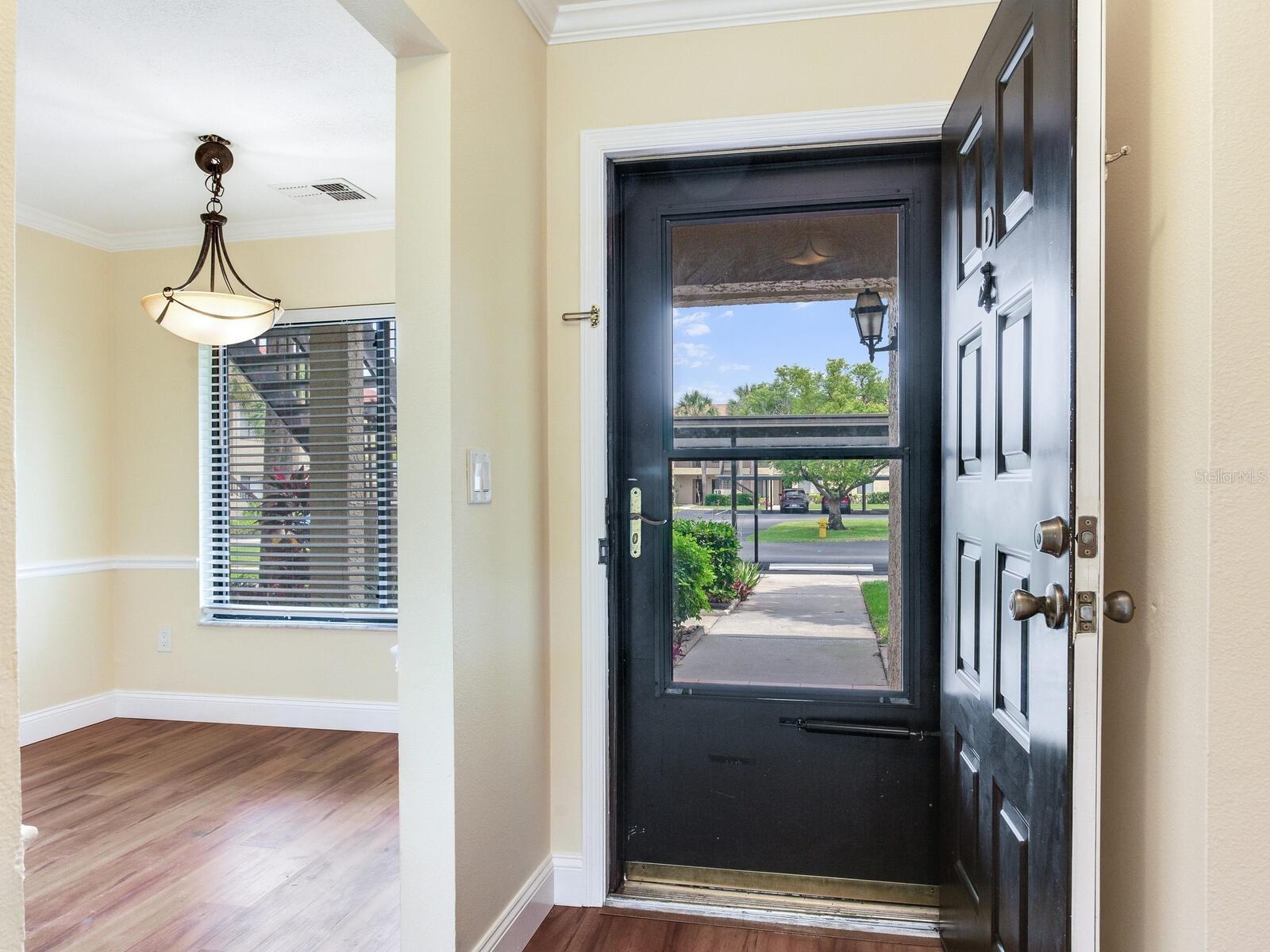 Front entrance with storm door