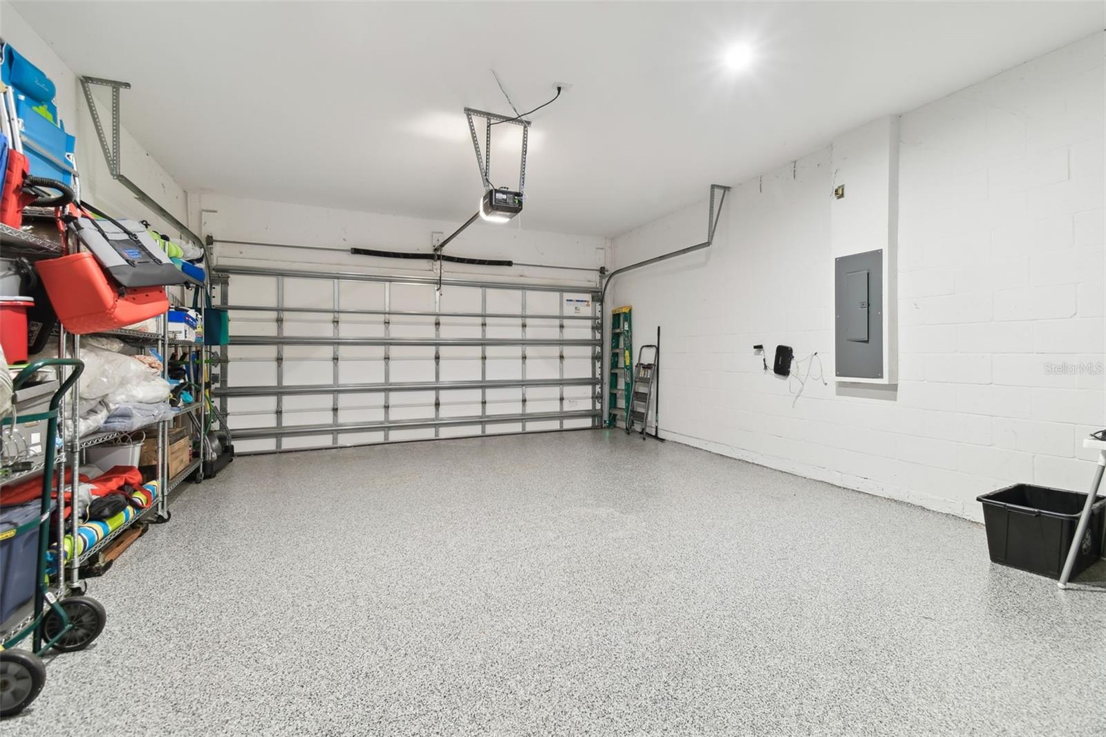 Extended garage with epoxy flooring