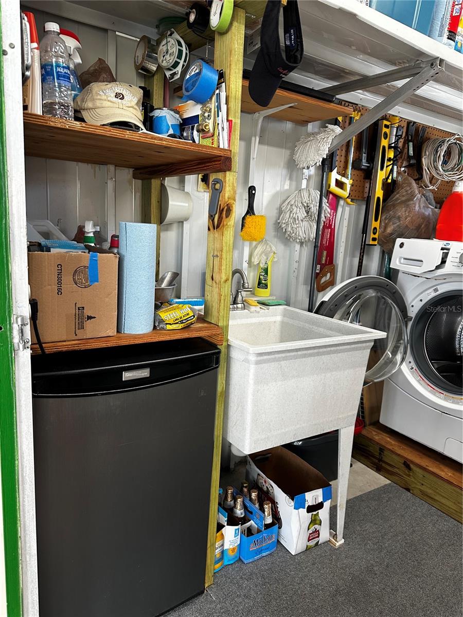 Shed storage with built-in shelves