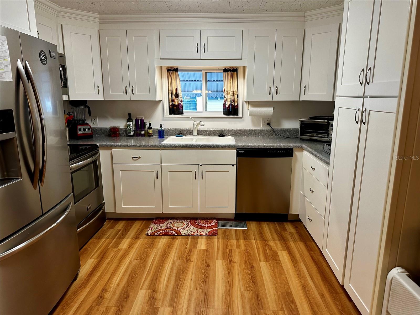 Kitchen with pull out shelves and soft close cabinets.