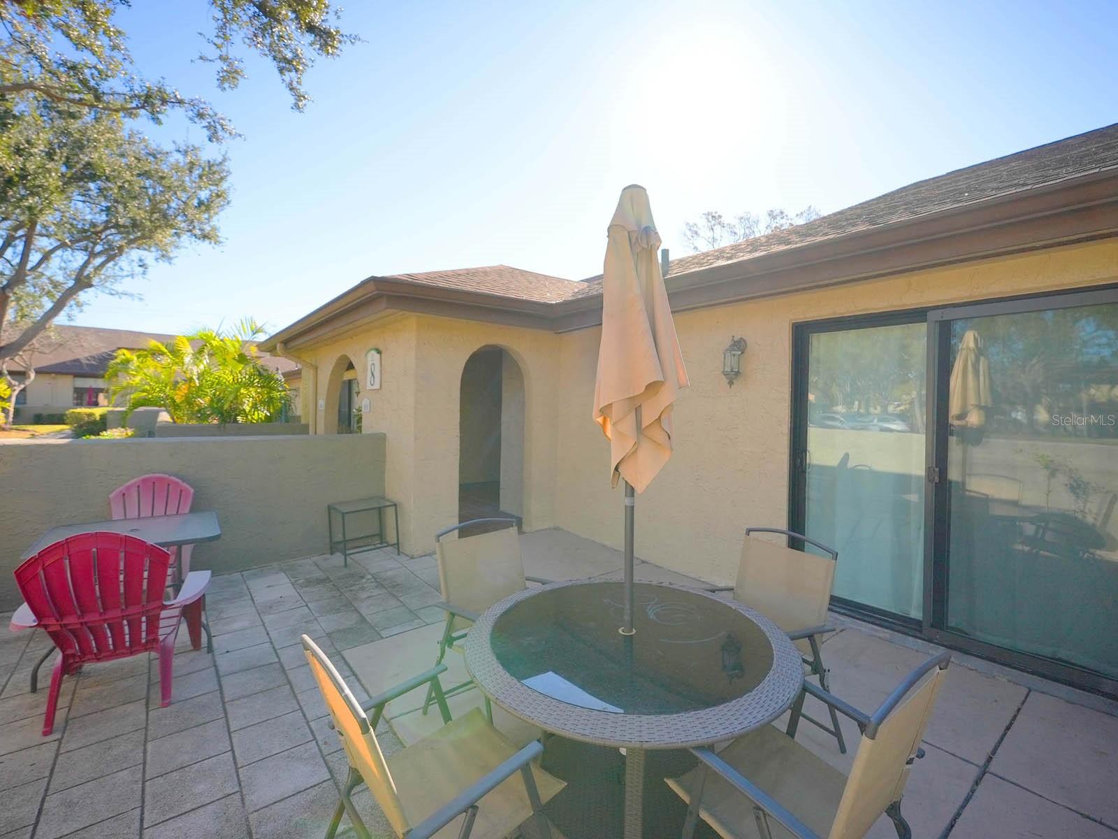 Private Tile Patio with Privacy Wall