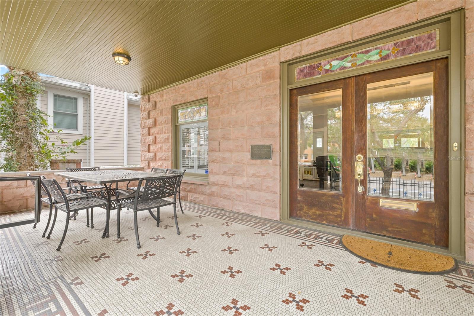 There is plenty of room on the front porch for entertaining guests.