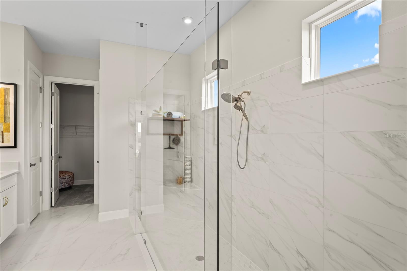 primary bath frameless glass shower